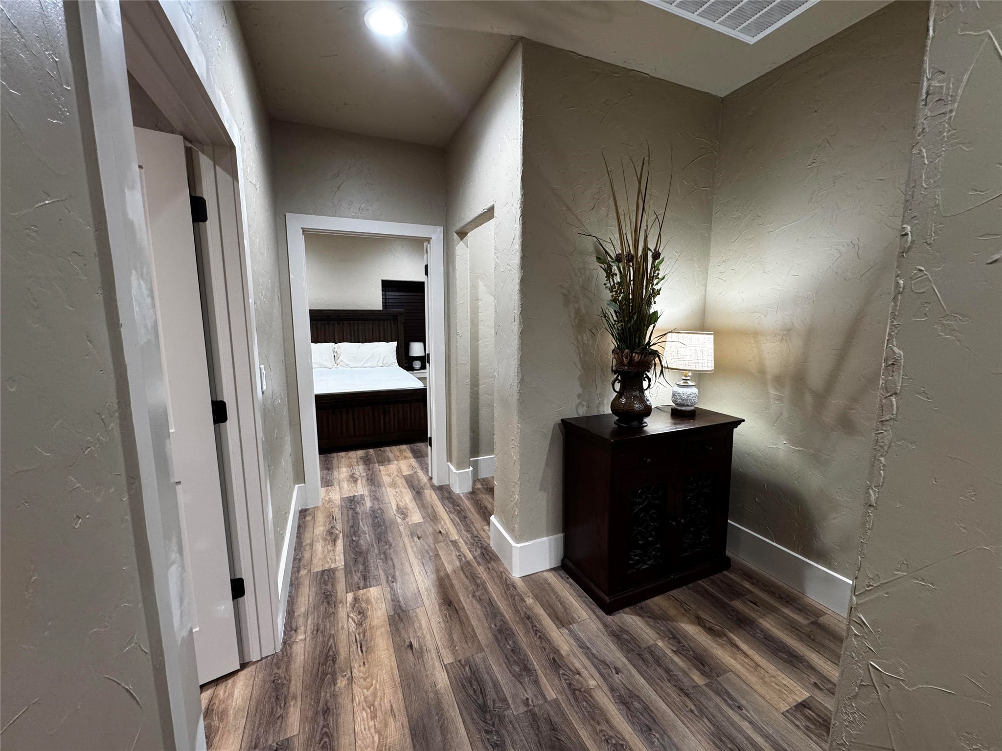 72 Circle Hook Port Port O'Connor, TX 77982 - Photo 39 of 43 a view of a hallway view with wooden floor and staircase