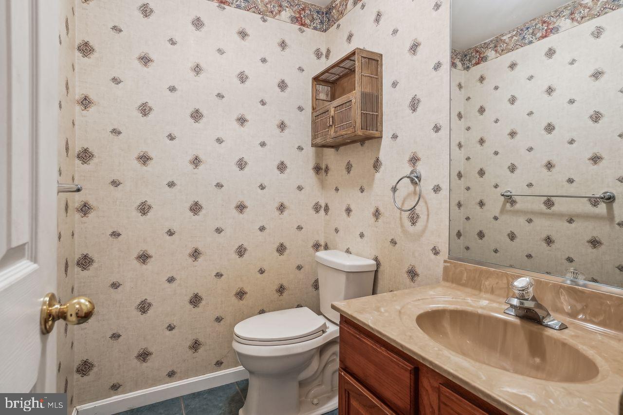 900 Harwood Road Davidsonville, MD 21035 - Photo 24 of 37 Half Hallway Bathroom