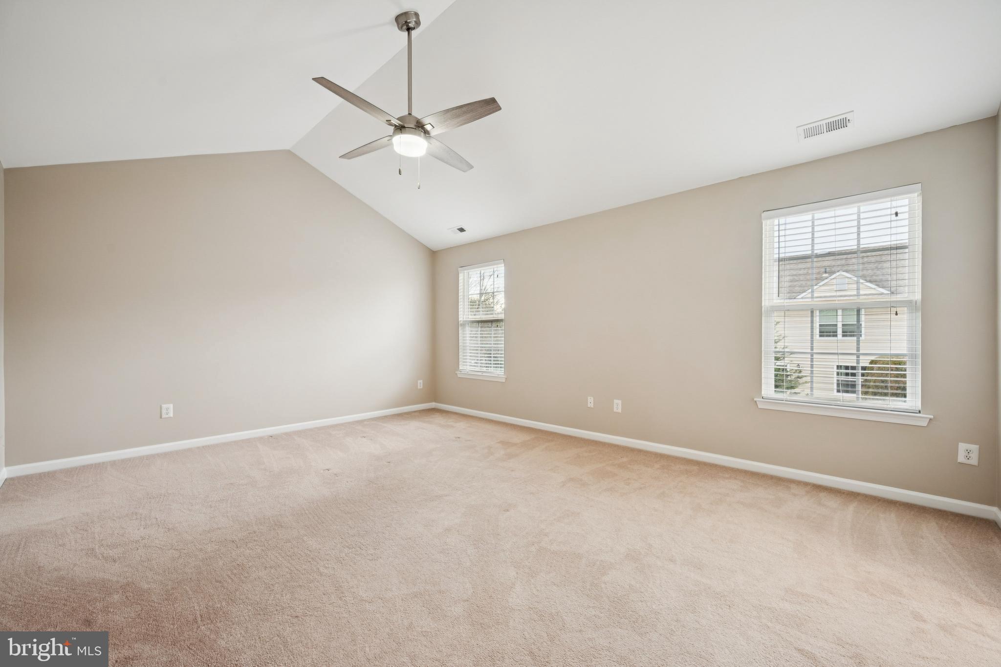 16 Hogan Way Moorestown, NJ 08057 - Photo 17 of 25 an empty room with a window and a fan