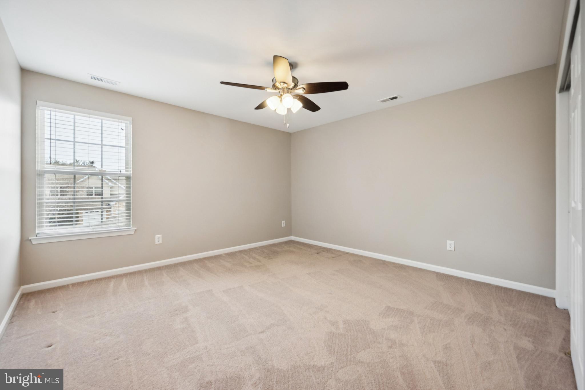 16 Hogan Way Moorestown, NJ 08057 - Photo 21 of 25 an empty room with windows and fan