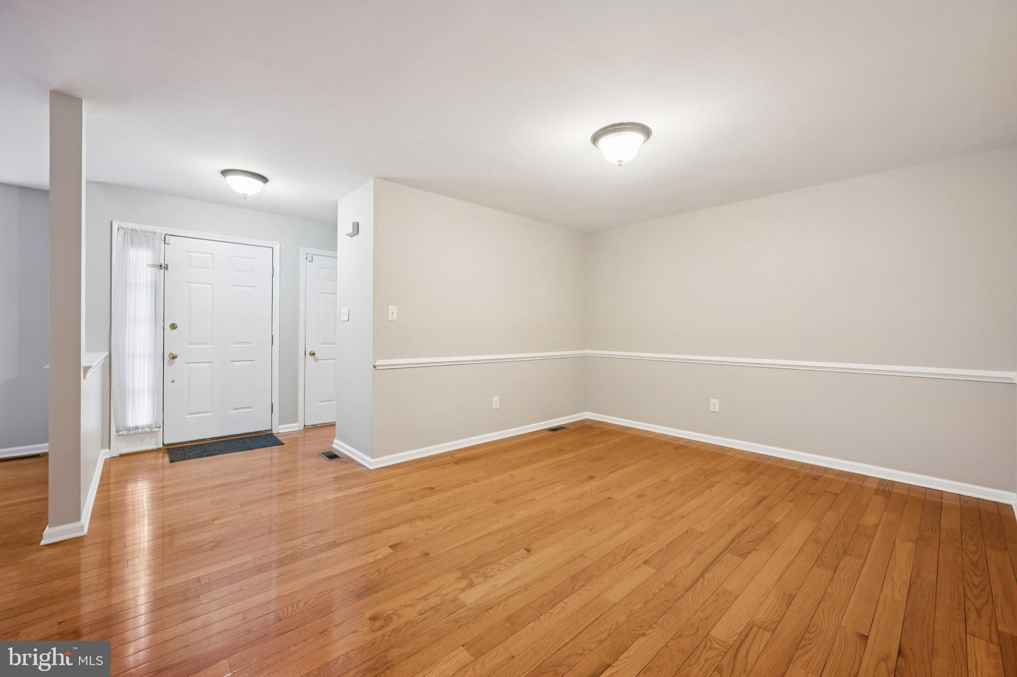 16 Hogan Way Moorestown, NJ 08057 - Photo 7 of 25 a view of an empty room with wooden floor
