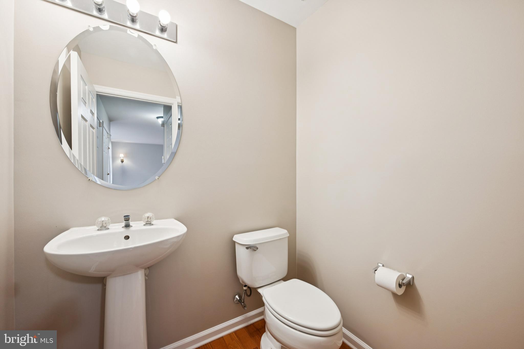 16 Hogan Way Moorestown, NJ 08057 - Photo 8 of 25 a bathroom with a toilet a sink and mirror