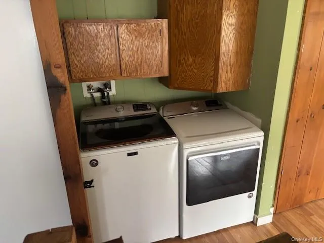 a utility room with a window dryer and washer
