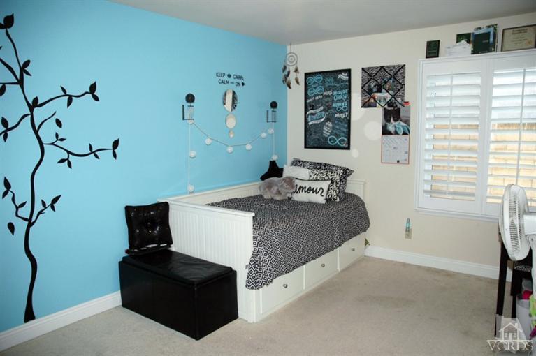 4783 Talmadge Road Moorpark, CA 93021 - Photo 22 of 25 a bedroom with a bed and a window