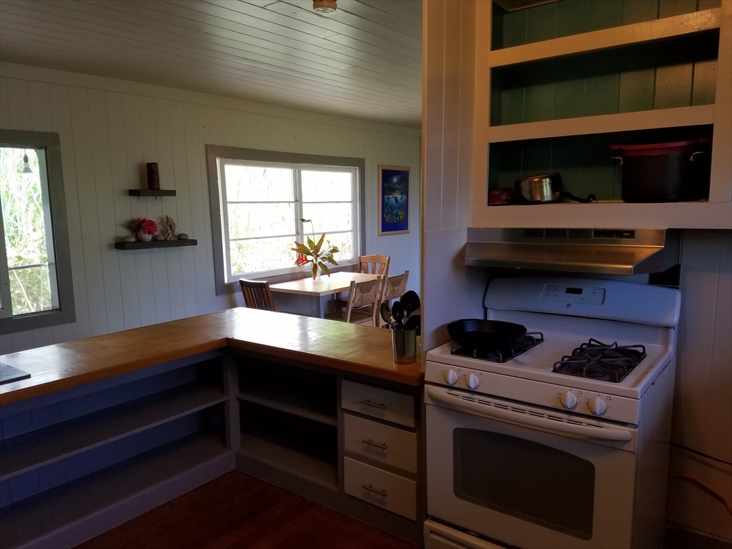 87-3460 Hawaii Belt Road Captain Cook, HI 96704 - Photo 21 of 25 a kitchen with a cabinets and window