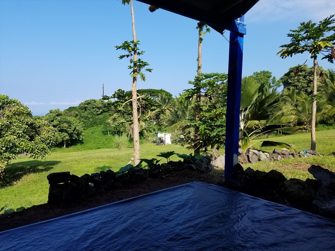 87-3460 Hawaii Belt Road Captain Cook, HI 96704 - Photo 25 of 25 a front view of a house with a yard