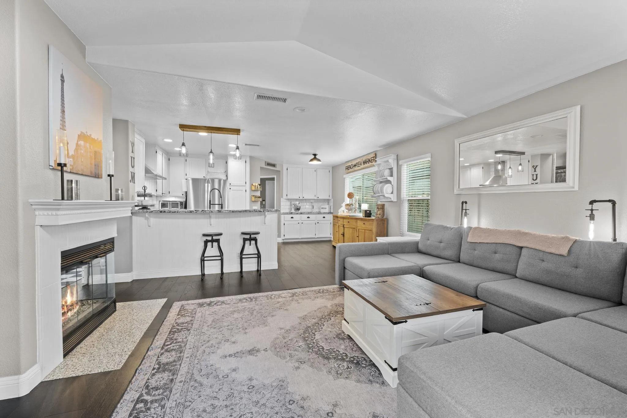 1846 Corte Pulsera Oceanside, CA 92056 - Photo 11 of 30 a living room with furniture and a fireplace