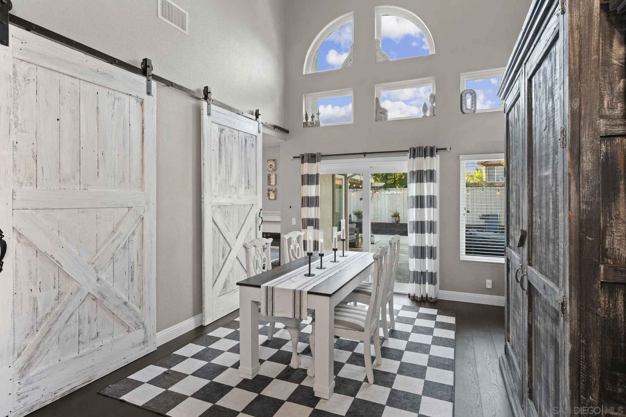 1846 Corte Pulsera Oceanside, CA 92056 - Photo 8 of 30 a dining room with a table and chairs