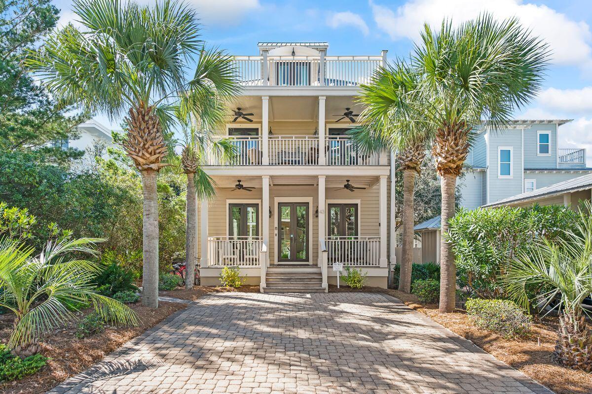 43 Sand Flea Drive Inlet Beach, FL 32461 - Photo 1 of 49 a front view of a house with a garden