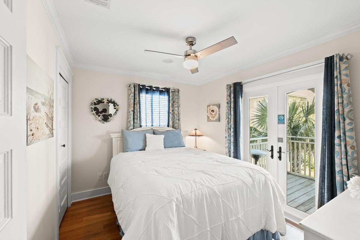 43 Sand Flea Drive Inlet Beach, FL 32461 - Photo 12 of 49 a bedroom with a large bed and a window