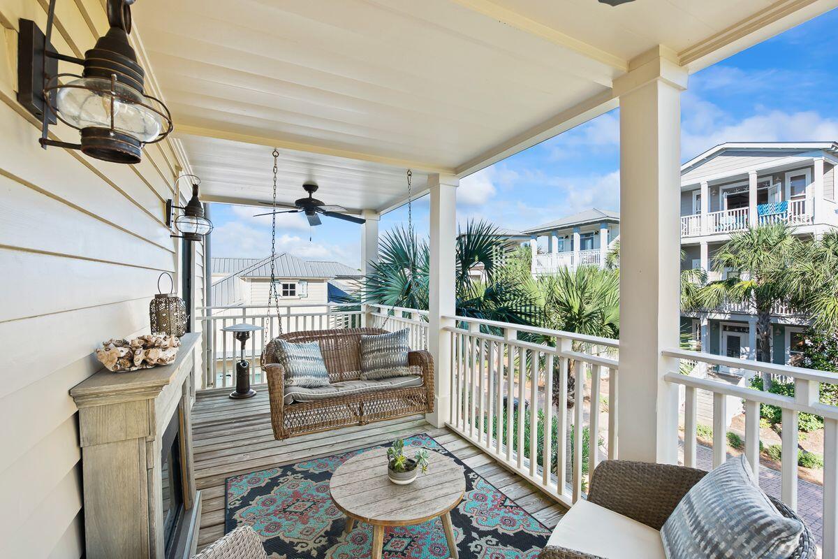 43 Sand Flea Drive Inlet Beach, FL 32461 - Photo 20 of 49 a balcony with furniture