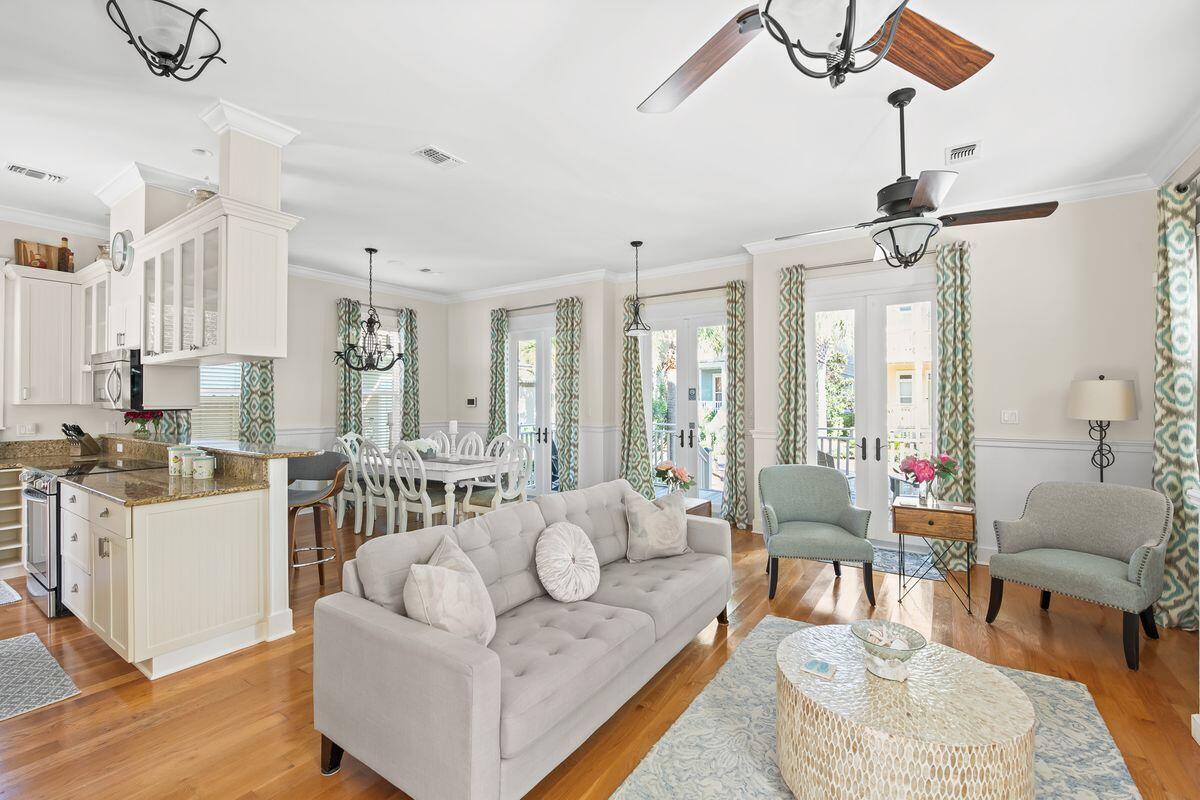 43 Sand Flea Drive Inlet Beach, FL 32461 - Photo 2 of 49 a living room with furniture and a chandelier