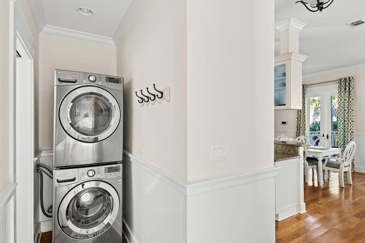 43 Sand Flea Drive Inlet Beach, FL 32461 - Photo 26 of 49 a view of a hallway with washer and dryer