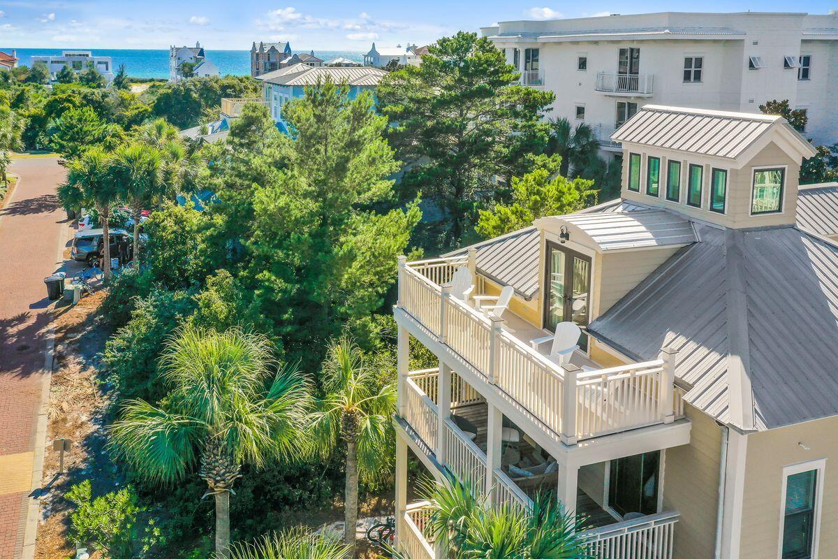 43 Sand Flea Drive Inlet Beach, FL 32461 - Photo 35 of 49 an aerial view of a house with balcony and trees al around