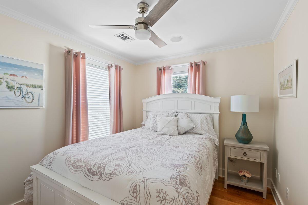 43 Sand Flea Drive Inlet Beach, FL 32461 - Photo 4 of 49 a bedroom with a bed and a lamp