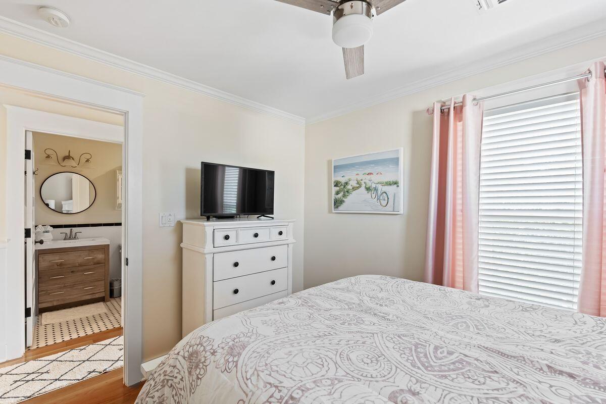 43 Sand Flea Drive Inlet Beach, FL 32461 - Photo 7 of 49 a bedroom with a bed and a flat screen tv