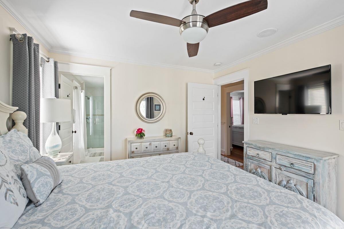 43 Sand Flea Drive Inlet Beach, FL 32461 - Photo 9 of 49 a bedroom with a bed and a flat screen tv