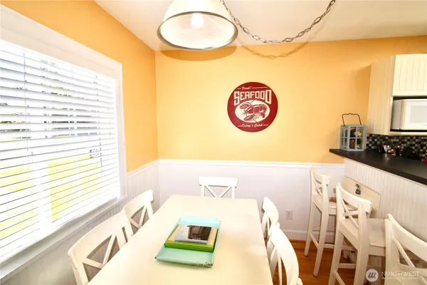 a view of a table and chair in a room