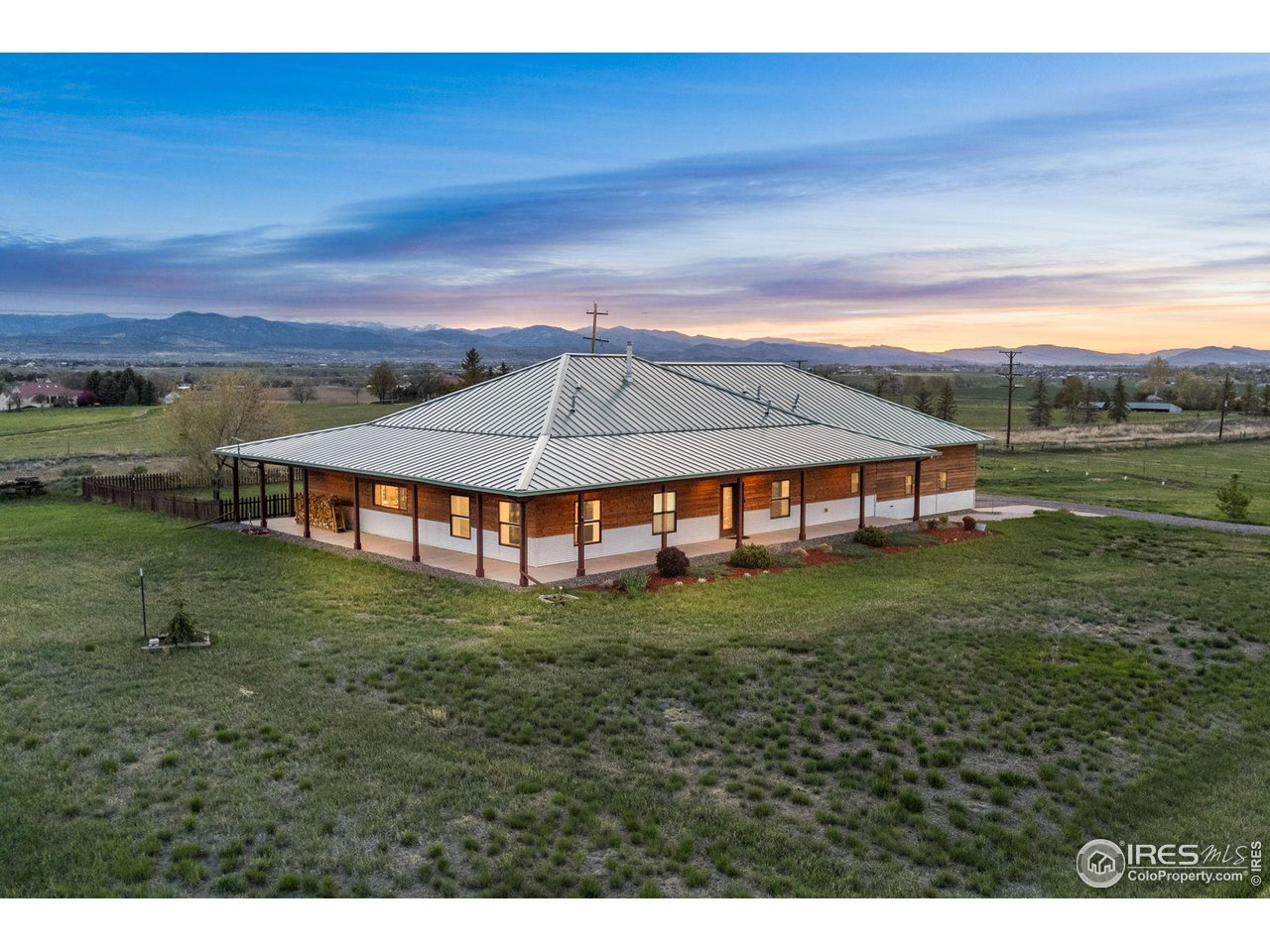 2139 County Road 15 Berthoud, CO 80513 - Photo 18 of 39 a aerial view of a house next to a big yard