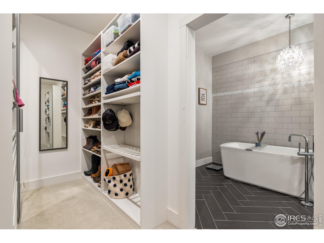 2139 County Road 15 Berthoud, CO 80513 - Photo 19 of 39 a living room with furniture and a wooden floor