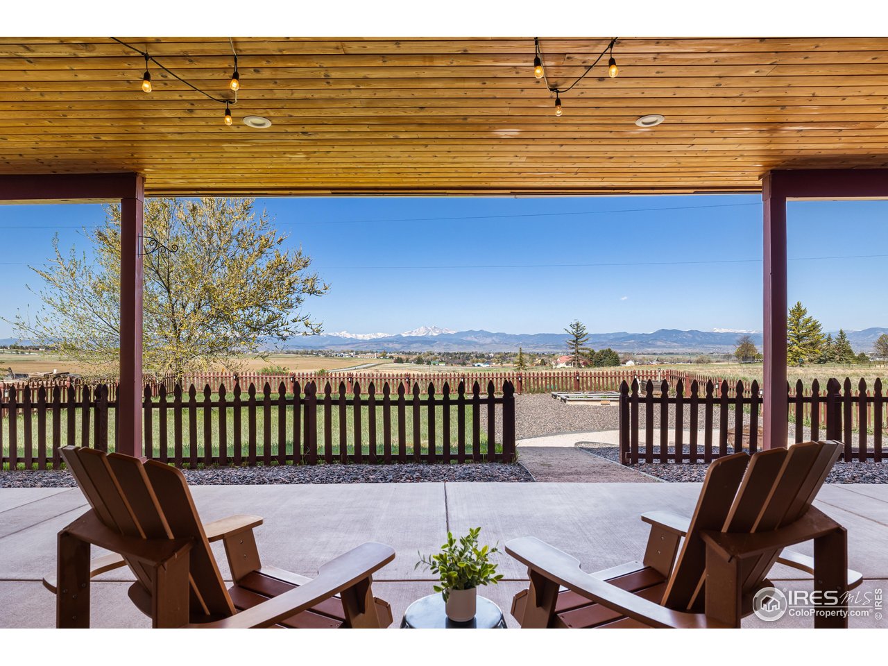 2139 County Road 15 Berthoud, CO 80513 - Photo 2 of 39 a view of a patio with wooden floor