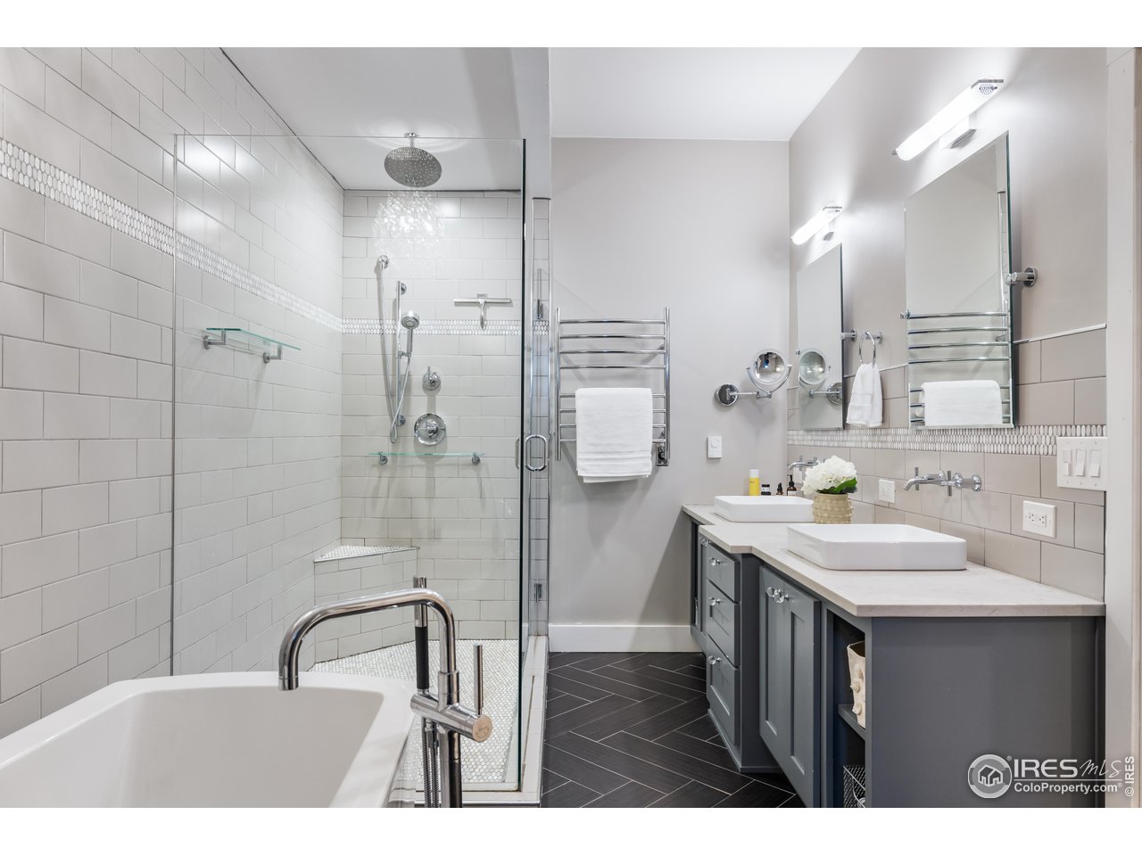 2139 County Road 15 Berthoud, CO 80513 - Photo 20 of 39 a bathroom with a sink mirror and a shower