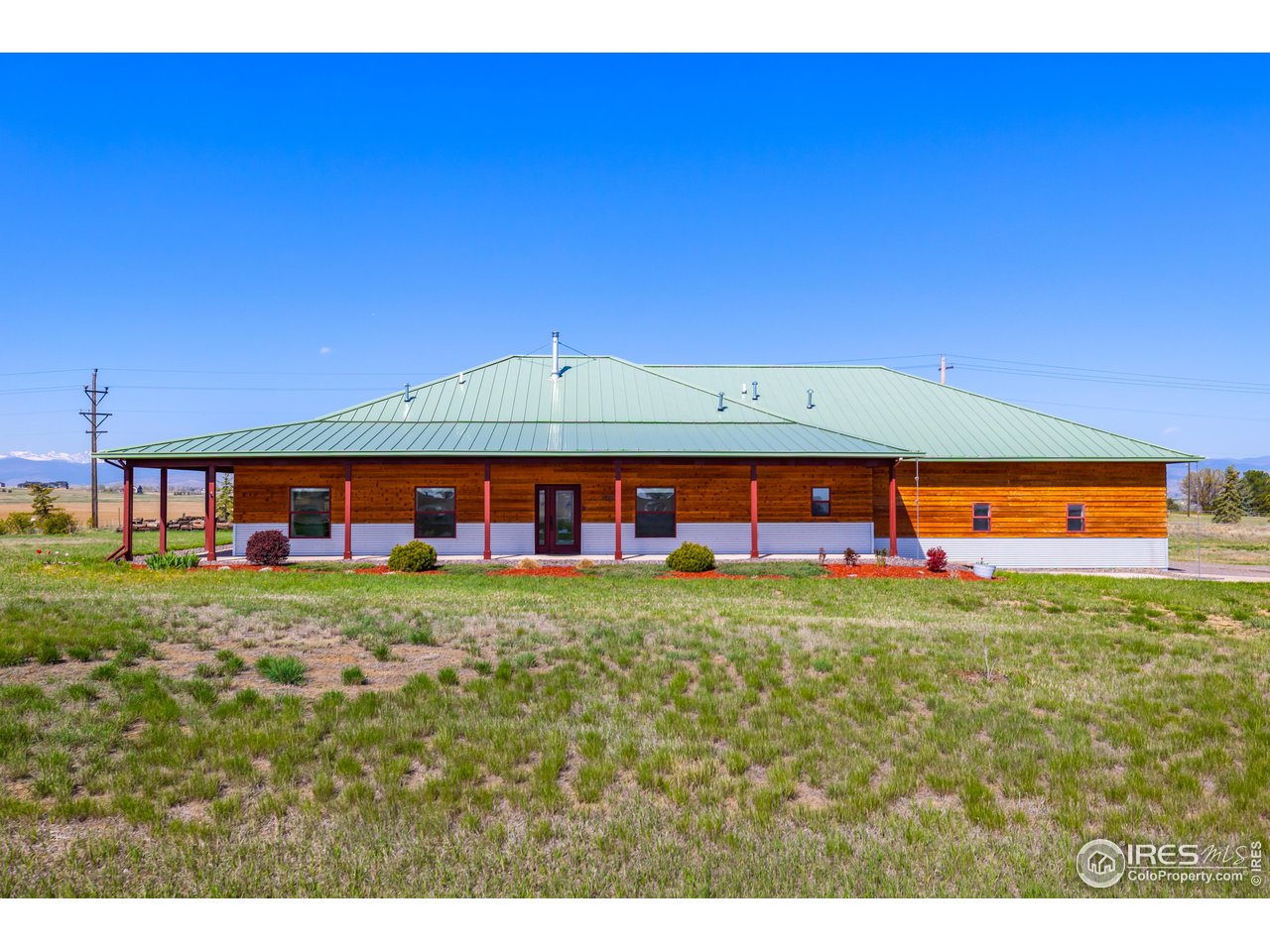 2139 County Road 15 Berthoud, CO 80513 - Photo 27 of 39 a view of a house with a yard