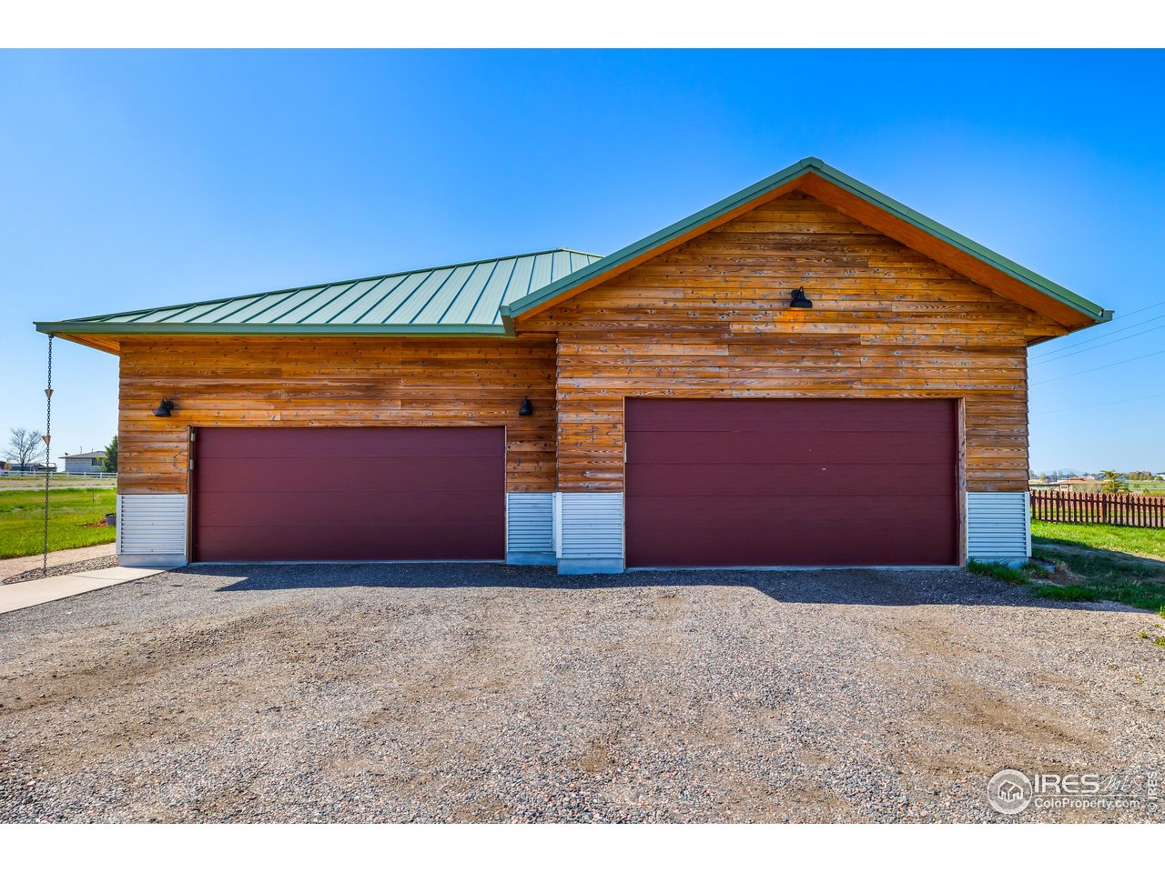 2139 County Road 15 Berthoud, CO 80513 - Photo 32 of 39 a front view of a house with a yard