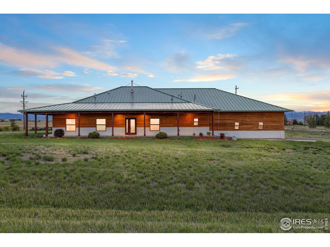 2139 County Road 15 Berthoud, CO 80513 - Photo 4 of 39 a view of a big house with a big yard