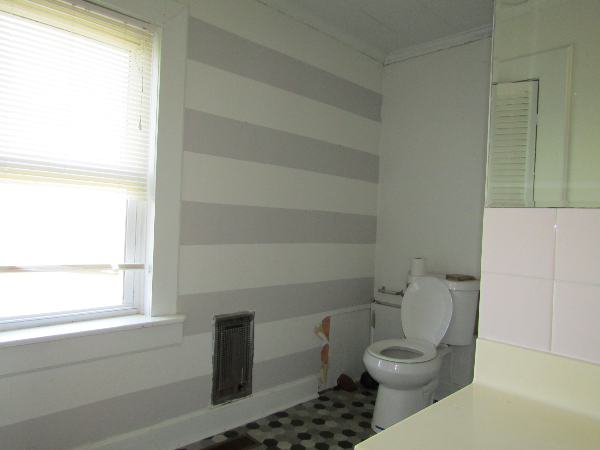 844 Brewstertown Road Robbins, TN 37852 - Photo 15 of 38 a white toilet sitting next to a window
