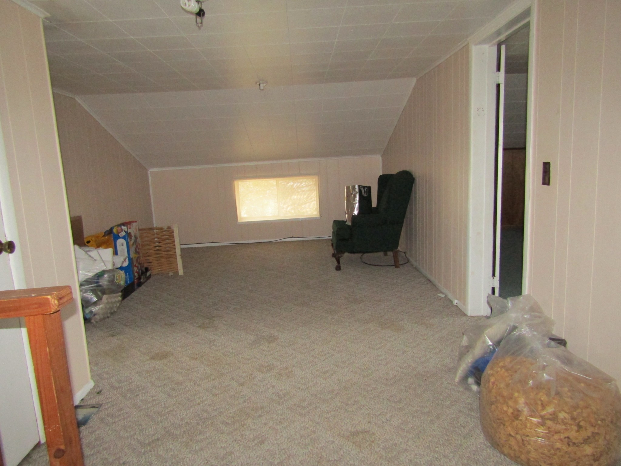 844 Brewstertown Road Robbins, TN 37852 - Photo 8 of 38 a living room with furniture and a chair