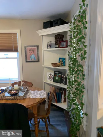 a dining room with a table and chairs in it