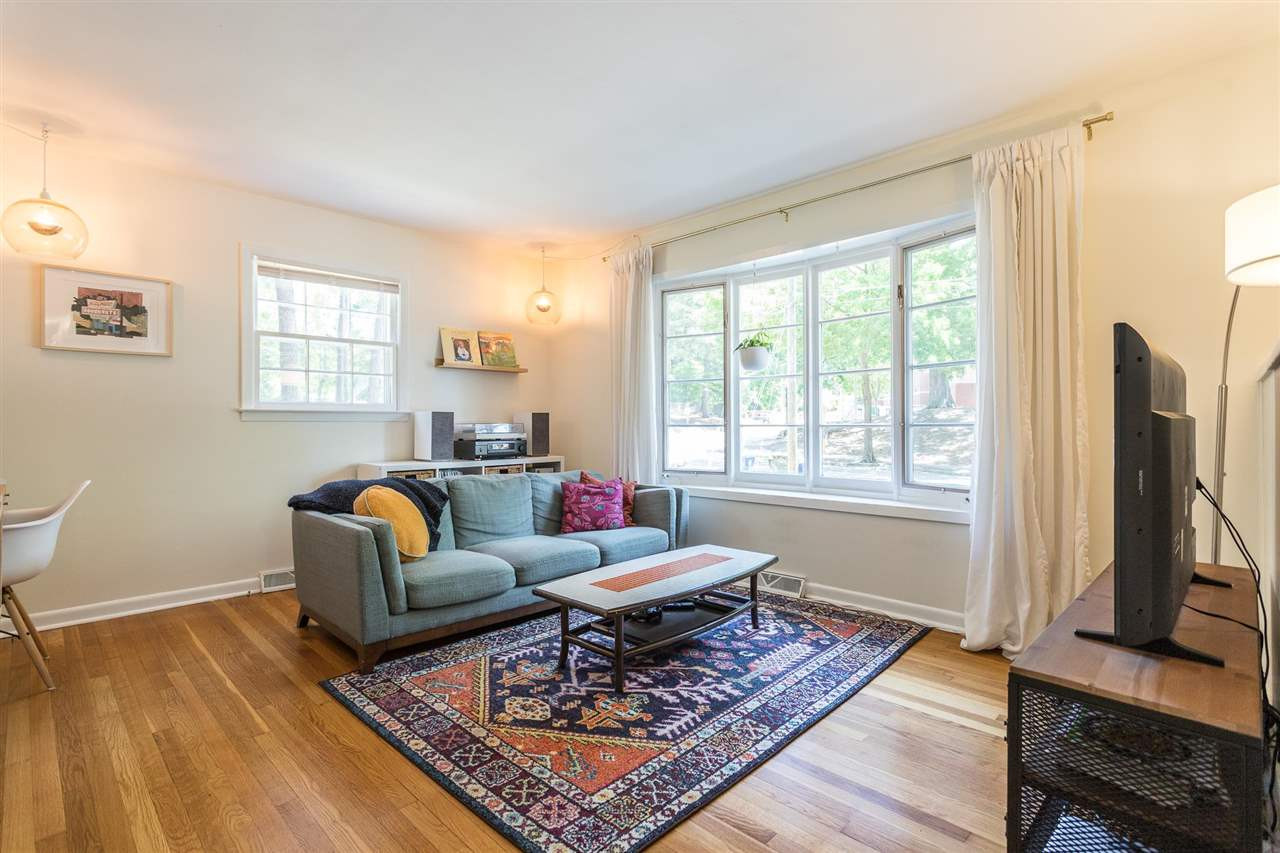 The bay window brightens the living room