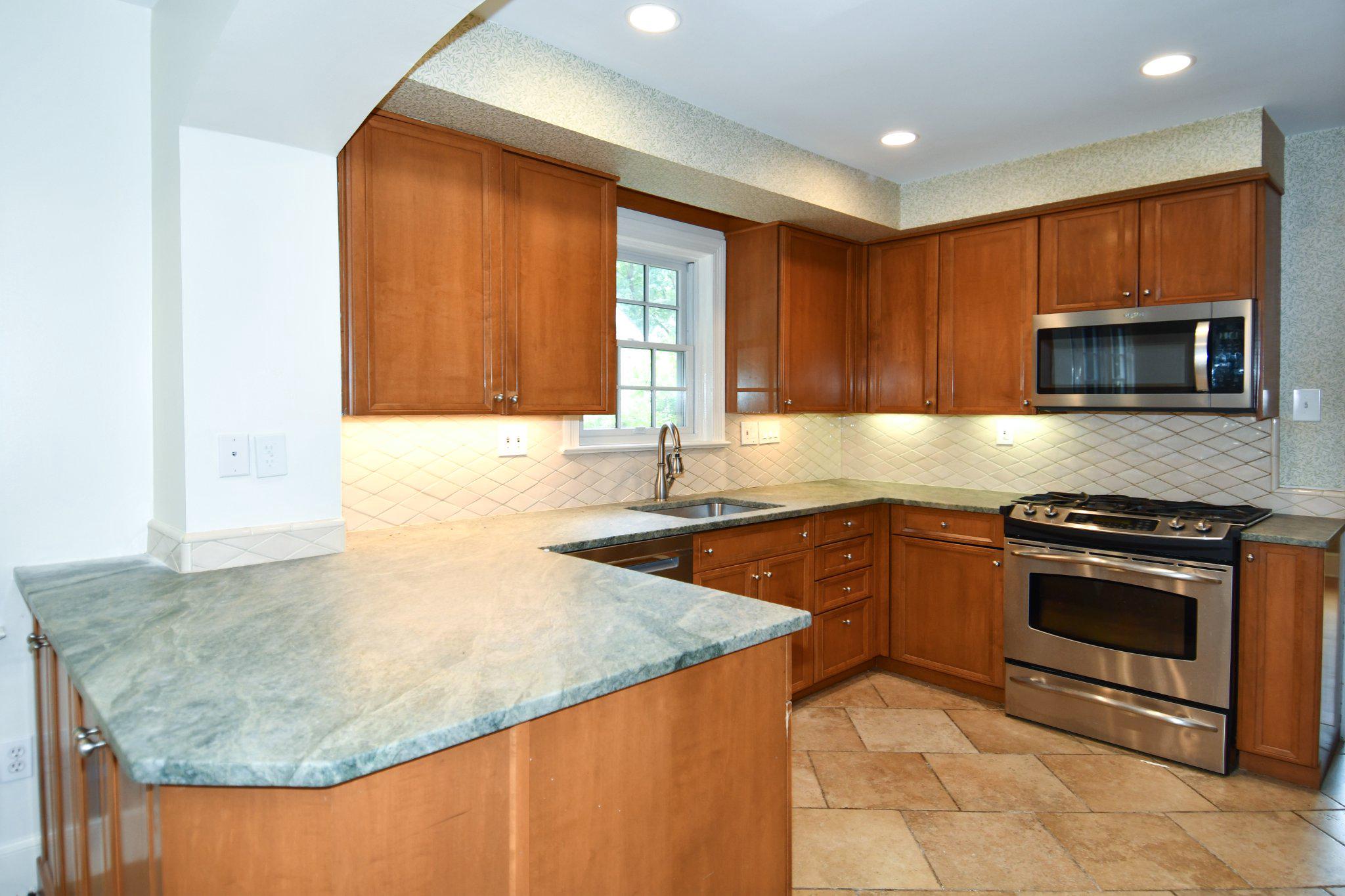 2608 Fordham Road Alexandria, VA 22302 - Photo 12 of 46 Modern kitchen with elegant finishes.