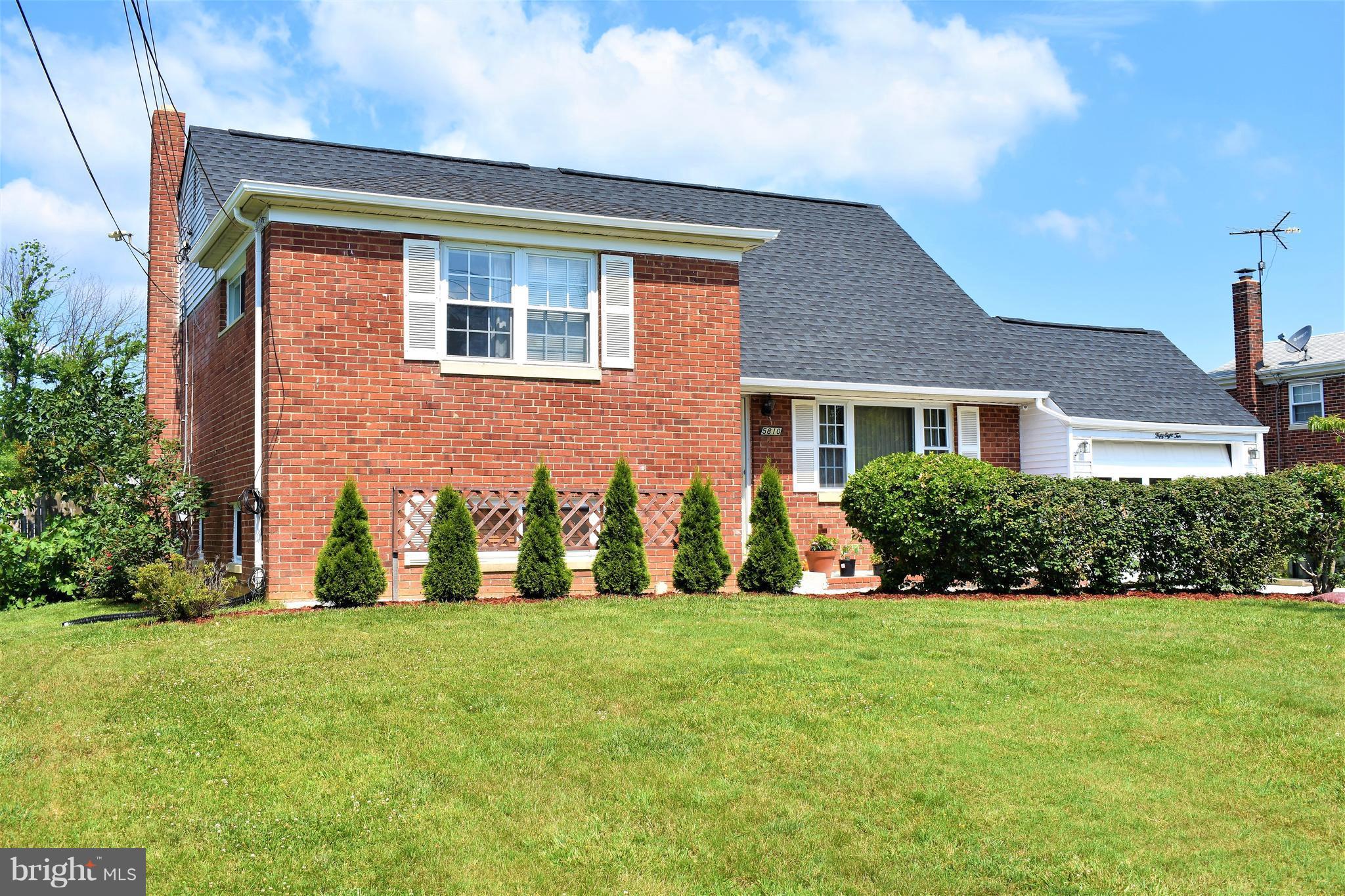 5810 Channing Road Springfield, VA 22150 - Photo 2 of 21 a front view of house with yard