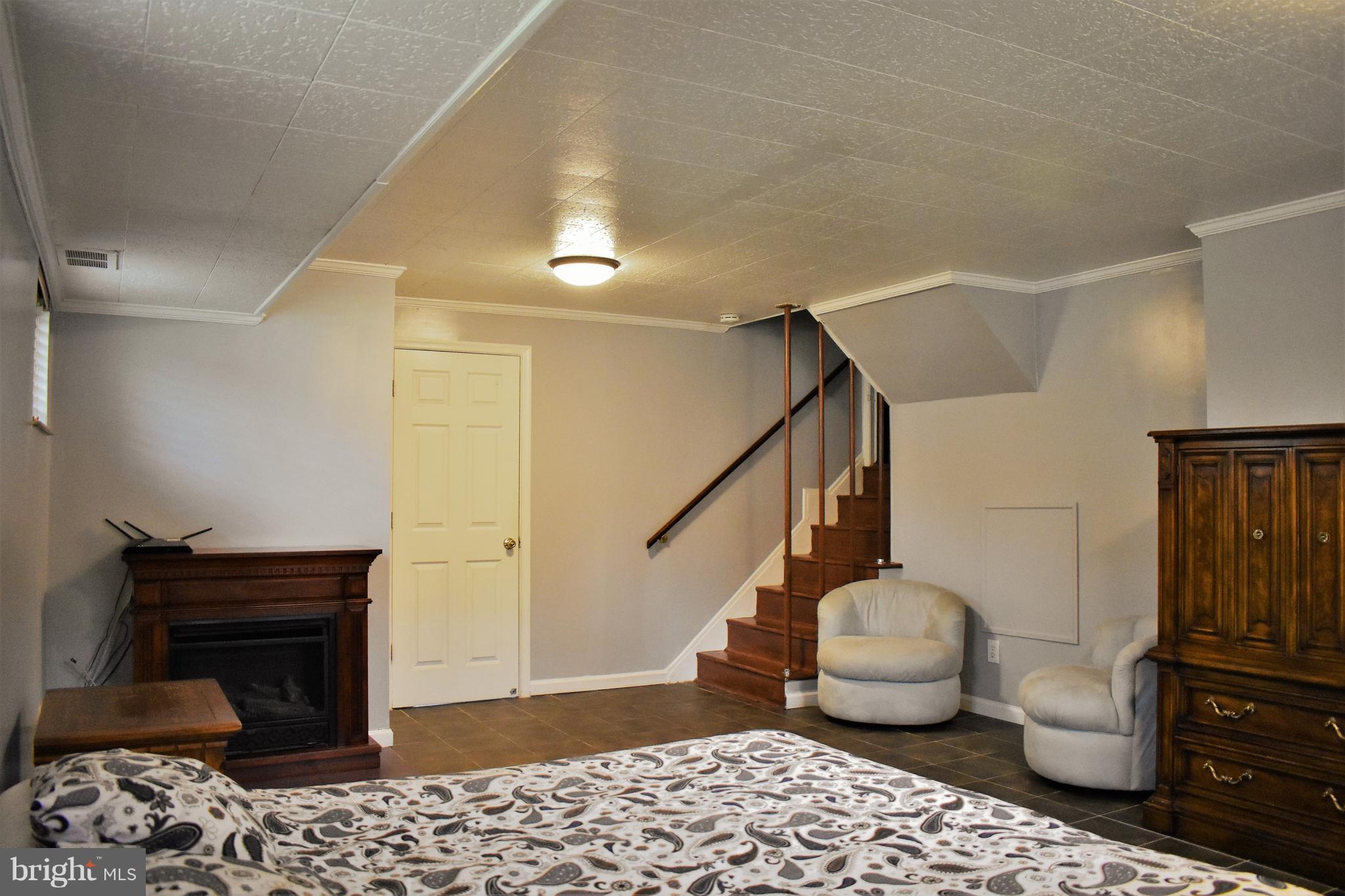 5810 Channing Road Springfield, VA 22150 - Photo 14 of 21 a living room with furniture and wooden floor