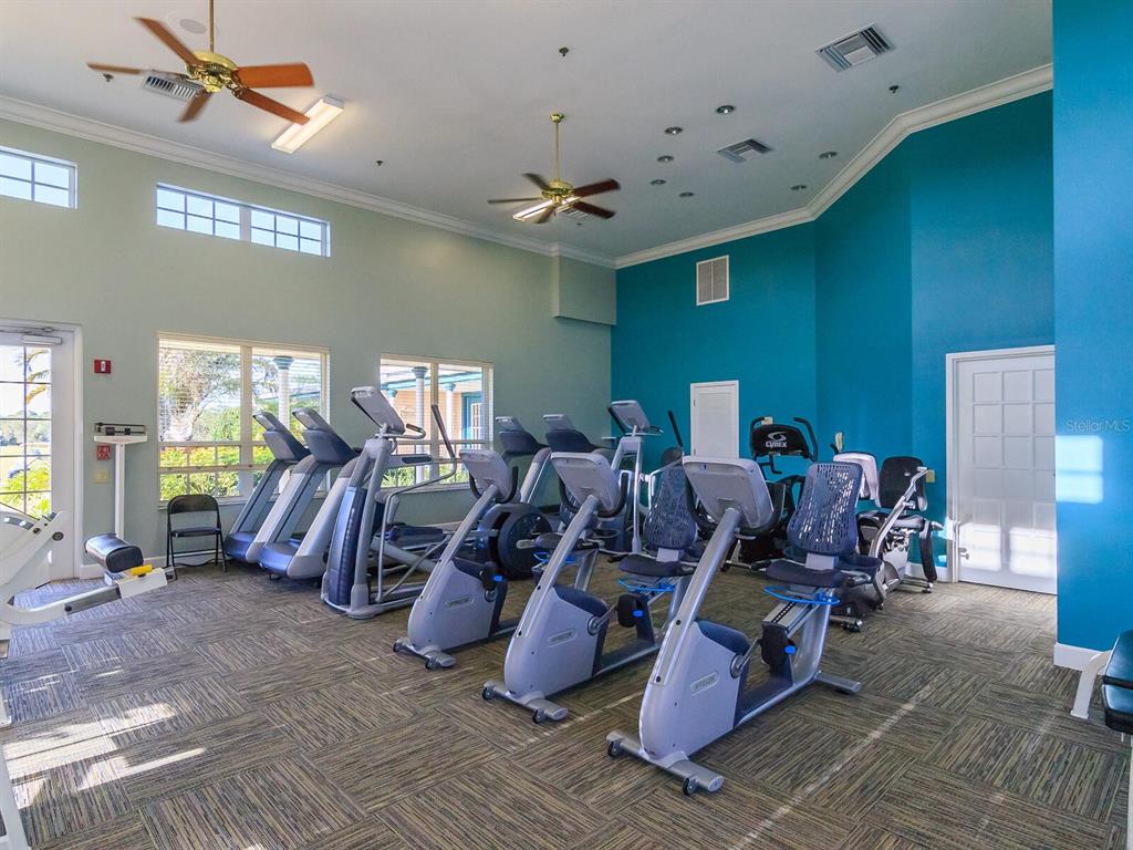 814 Adonis Place Venice, FL 34292 - Photo 37 of 38 a view of a room with gym equipment