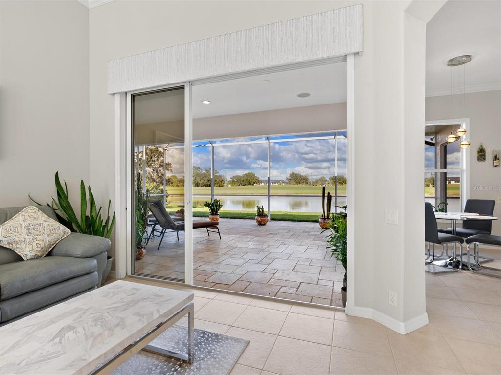 814 Adonis Place Venice, FL 34292 - Photo 5 of 38 a living room with furniture