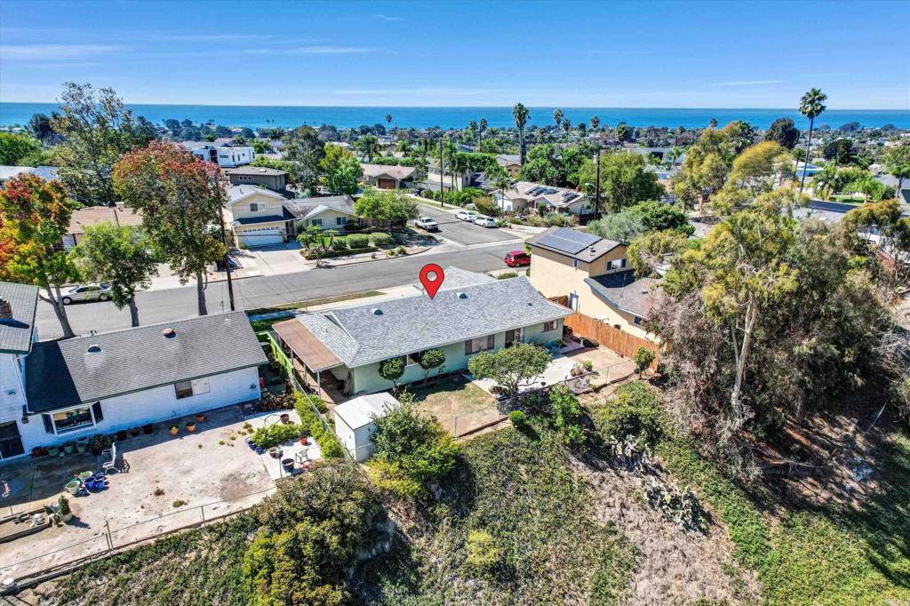 1044 Nolbey Street Cardiff-by-the-Sea, CA 92007 - Photo 1 of 1 an aerial view of a house with a garden