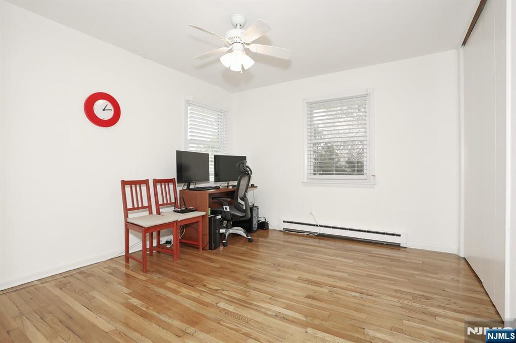7 Tufts Court Paramus, NJ 07652 - Photo 23 of 50 a view of a livingroom with furniture and a window