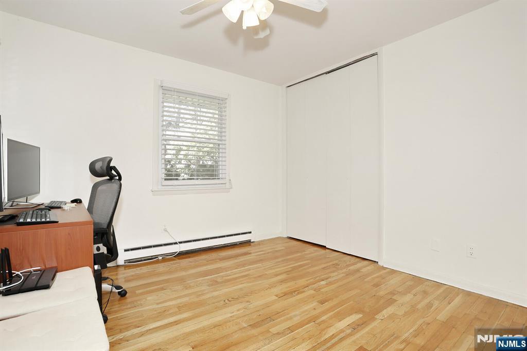 7 Tufts Court Paramus, NJ 07652 - Photo 24 of 50 a view of a room with gym equipment and a window