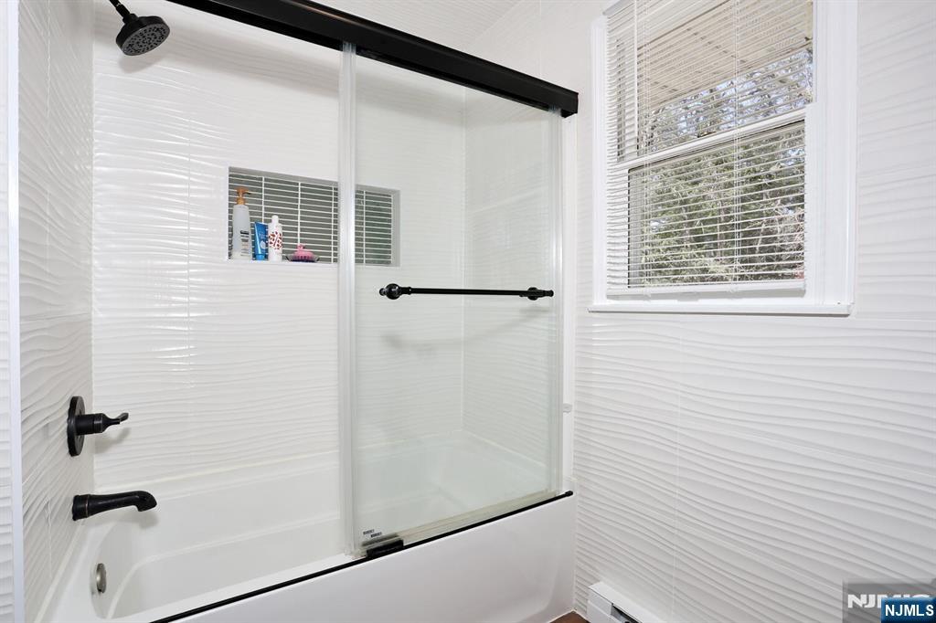 7 Tufts Court Paramus, NJ 07652 - Photo 26 of 50 a bathroom with a shower