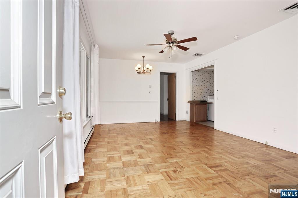 7 Tufts Court Paramus, NJ 07652 - Photo 27 of 50 a view of an empty room with a window
