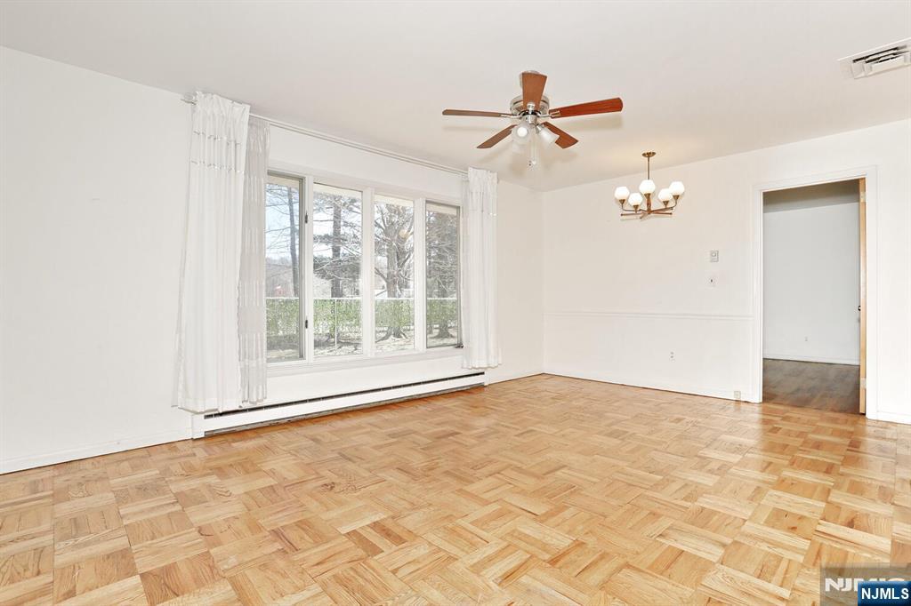 7 Tufts Court Paramus, NJ 07652 - Photo 29 of 50 a view of an empty room with a window