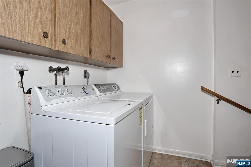7 Tufts Court Paramus, NJ 07652 - Photo 33 of 50 a utility room with dryer and washer