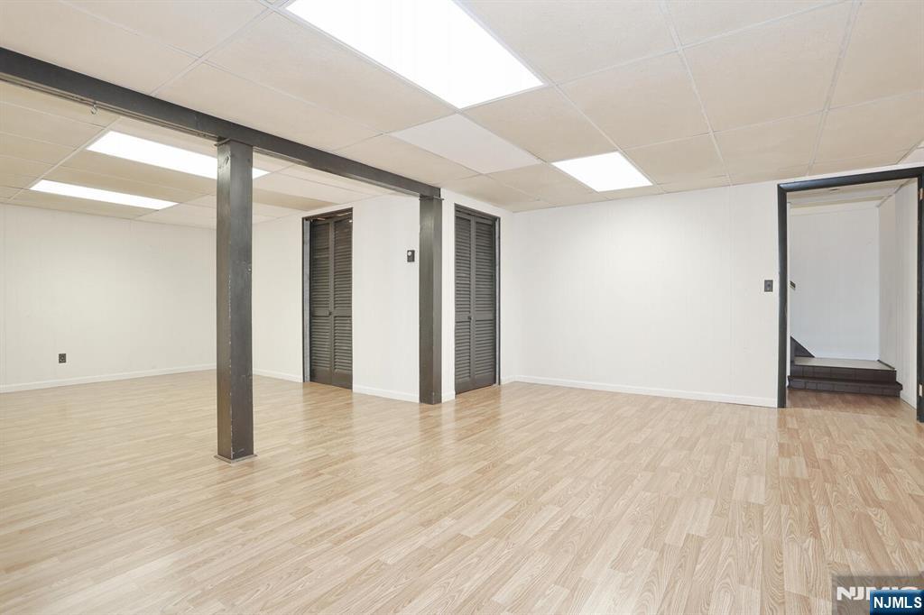 7 Tufts Court Paramus, NJ 07652 - Photo 35 of 50 a view of empty room with wooden floor