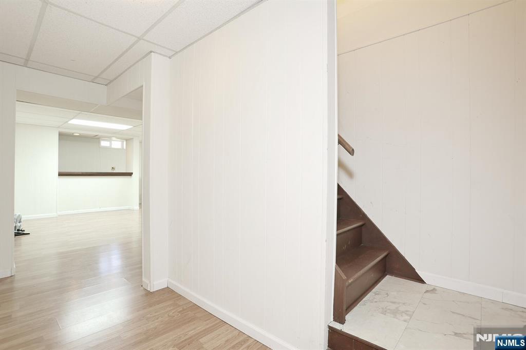 7 Tufts Court Paramus, NJ 07652 - Photo 37 of 50 a view of a hallway with wooden floor