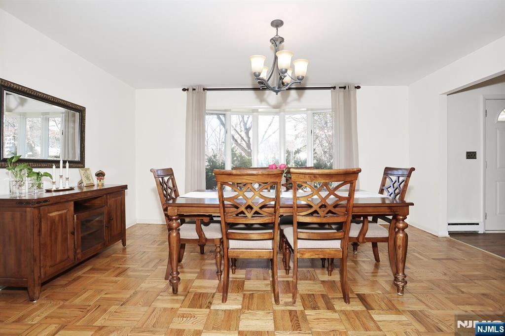 7 Tufts Court Paramus, NJ 07652 - Photo 7 of 50 a view of a dining room with furniture and window