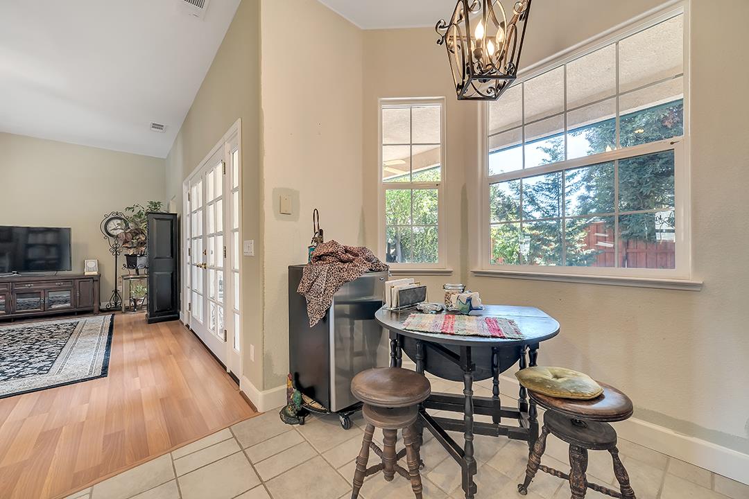 916 East Milgeo Avenue Ripon, CA 95366 - Photo 23 of 36 a view of a dining room with furniture window and outside view