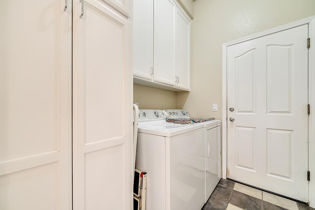 916 East Milgeo Avenue Ripon, CA 95366 - Photo 24 of 36 a view of hallway with washer and dryer